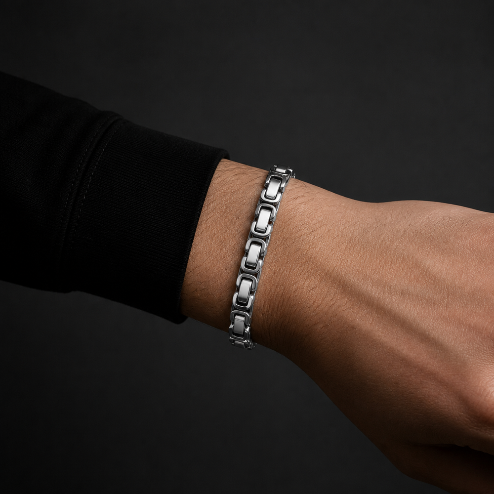 Obelisk Link bracelet worn with a black sleeve