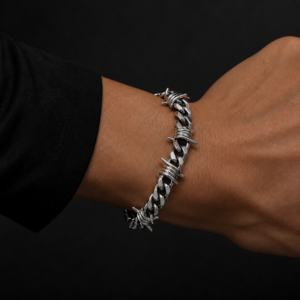 Razorwire Chain bracelet worn with a black sleeve